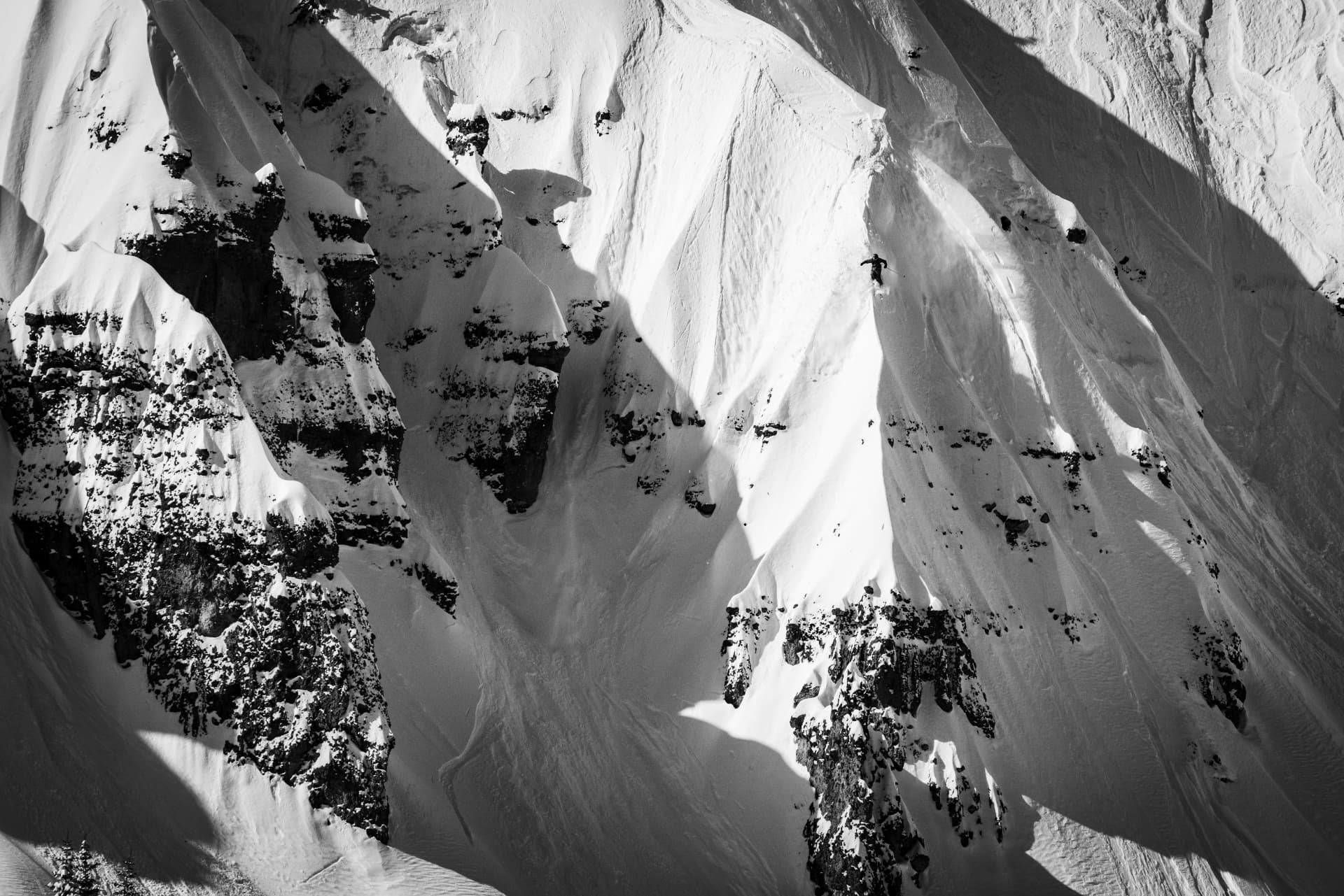 Dillon Flinders skiing a steep, sunlit spine in big-mountain terrain